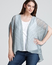 Subtle tie-dye streaks across a sheer Bloomingdale's Exclusive Gypsy 05 Plus top for pure bohemian elegance. Subtle tie-dye streaks across a sheer Bloomingdale's Exclusive Gypsy 05 Plus top for pure bohemian elegance.