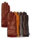 UGG® Australia's cashmere-lined leather gloves take a hip turn with the addition of a ribbed knit cuff and edgy zipper.
