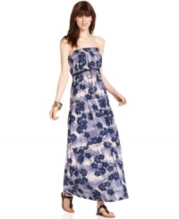 Channel island style in this maxi dress by DKNY Jeans. A tonal floral print and tiered silhouette lend a cool, 1970's vibe to this easy piece. Channel island style in this maxi dress by DKNY Jeans. A tonal floral print and tiered silhouette lend a cool, 1970's vibe to this easy piece.