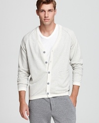 In a cozy, sweatshirt-inspired knit with a subtle herringbone pattern, ALTERNATIVE's Hal cardigan offers comfortable, laid-back style. In a cozy, sweatshirt-inspired knit with a subtle herringbone pattern, ALTERNATIVE's Hal cardigan offers comfortable, laid-back style.
