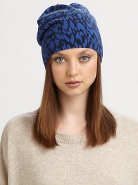 A bold animal print lends a wild touch to an ultra-soft wool and angora blend topper.Merino Wool/Angora/Nylon10W X 9.5LDry cleanImported A bold animal print lends a wild touch to an ultra-soft wool and angora blend topper.Merino Wool/Angora/Nylon10W X 9.5LDry cleanImported