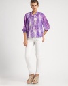 An easy-fit button-down shaped by soft pleats at the shoulders and gathered three-quarter sleeves, all in tie-dyed stretch silk.Band collarButton-down placketThree-quarter sleevesShirred cuffsShirttail hemBack yokeAbout 24 from shoulder to hem96% silk/4% spandexDry cleanImportedModel shown is 5'10 (177cm) wearing US size Small.