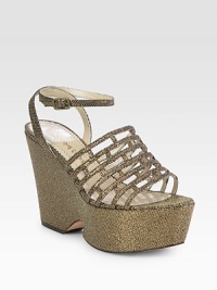 Glitter-coated metallic lurex wedge with a glitzy, cage-like upper and an adjustable ankle strap. Self-covered wedge, 4½ (115mm)Covered platform, 2 (50mm)Compares to a 2½ heel (65mm)Glitter-coated metallic lurex upperLeather and lurex liningBuffed leather solePadded insoleImported Glitter-coated metallic lurex wedge with a glitzy, cage-like upper and an adjustable ankle strap. Self-covered wedge, 4½ (115mm)Covered platform, 2 (50mm)Compares to a 2½ heel (65mm)Glitter-coated metallic lurex upperLeather and lurex liningBuffed leather solePadded insoleImported