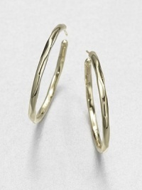 From the Glamazon Collection. Simple, sculptural hoops in subtly faceted gold are both modern and timeless.18k yellow goldDiameter, about 1.6Post backImported From the Glamazon Collection. Simple, sculptural hoops in subtly faceted gold are both modern and timeless.18k yellow goldDiameter, about 1.6Post backImported