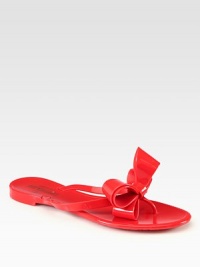 A dimensional bow upgrades this casual staple in ultra-smooth PVC. PVC upperPVC lining and soleMade in Italy A dimensional bow upgrades this casual staple in ultra-smooth PVC. PVC upperPVC lining and soleMade in Italy