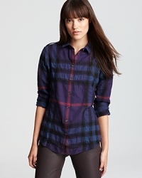 Say goodbye to lumberjack plaids, this Burberry Brit shirt gives the classic style a cool new spin with metallic hardware and an ultramodern palette. Say goodbye to lumberjack plaids, this Burberry Brit shirt gives the classic style a cool new spin with metallic hardware and an ultramodern palette.