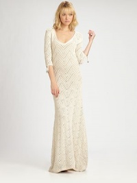 Fabulously long and lean maxi dress of crocheted cotton with beaded fringe detail on the sleeve.V-neckAbout 56 from natural waistCottonDry cleanImported Model shown is 5'9½ (176cm) wearing US size Small Fabulously long and lean maxi dress of crocheted cotton with beaded fringe detail on the sleeve.V-neckAbout 56 from natural waistCottonDry cleanImported Model shown is 5'9½ (176cm) wearing US size Small