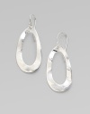 From the Scultura Collection. A newly textured oval design in gleaming sterling silver.Sterling silver Ear wire Drop, about 1¾ Imported
