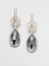 From the Bedeg Collection. A pretty teardrop of faceted hematite dances with light as it hangs from a graceful beaded setting of sterling silver.HematiteSterling silverDrop, about 1.8Width, about .5Post backMade in Bali