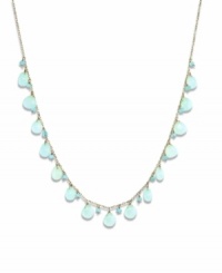 Like brilliant blue skies, this collection of apatite (3 mm) and chalcedony (7 mm) gemstones creates a breathtaking view across this shapely necklace. Gems are set in 14k gold. Approximate length: 16 inches.