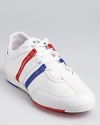 An updated Adidas style, with the classic triple stripe accent rendered in red, white and blue.
