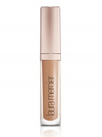 A high-shine, perfectly pigmented lip gloss with rich, long-lasting colour and brilliant shine that creates the appearance of fuller lips. Any skin tone is virtually enhanced by creating a subtle contrast in texture. With the unique blendof moisturizing, anti-aging, anti-oxidant and plumping ingredients provided by the Laura Mercier Lip Complex, the non-sticky gloss formula applies smoothly without feathering or bleeding. A high-shine, perfectly pigmented lip gloss with rich, long-lasting colour and brilliant shine that creates the appearance of fuller lips. Any skin tone is virtually enhanced by creating a subtle contrast in texture. With the unique blendof moisturizing, anti-aging, anti-oxidant and plumping ingredients provided by the Laura Mercier Lip Complex, the non-sticky gloss formula applies smoothly without feathering or bleeding.