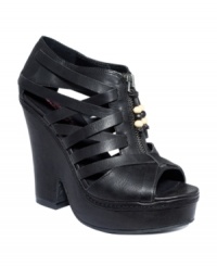 Beaded zippers top off a cool criss-crossing upper design. American Rag's Trish platform sandals will add height and style to even the most structured looks. Beaded zippers top off a cool criss-crossing upper design. American Rag's Trish platform sandals will add height and style to even the most structured looks.