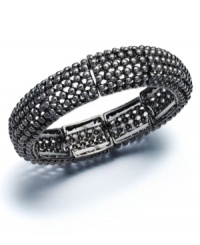 Get ready for an evening of glamour. Slip this Alfani bracelet over your wrist for head-turning shine. Crafted in hematite tone mixed metal. Bracelet stretches to fit wrist. Approximate length: 7-1/2 inches. Approximate diameter: 2 inches. Get ready for an evening of glamour. Slip this Alfani bracelet over your wrist for head-turning shine. Crafted in hematite tone mixed metal. Bracelet stretches to fit wrist. Approximate length: 7-1/2 inches. Approximate diameter: 2 inches.
