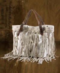 An ode to the romance of a summer by the seaside, Denim & Supply Ralph Lauren's canvas bag is awash in underwater inspiration with bits of seashells and beach debris caught in its swingy suede fringe.