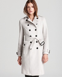 This iconic Burberry London trench coat is rendered in rich wool and features finely appointed details like designer-embossed buttons, military-inspired epaulets and a signature check lining. Refined enough for the workday, but chic enough for evening-this is the fashion investment your winter wardrobe has been wanting for. This iconic Burberry London trench coat is rendered in rich wool and features finely appointed details like designer-embossed buttons, military-inspired epaulets and a signature check lining. Refined enough for the workday, but chic enough for evening-this is the fashion investment your winter wardrobe has been wanting for.
