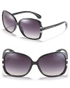 Elegant oversized sunglasses with metal stripe trim and signature logo at temples from MARC BY MARC JACOBS.