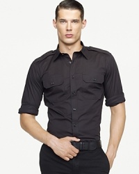 Crafted in Italy from sleek stretch poplin and finished with military-inspired details, the classic sport shirt is finely tailored with a trim fit and modern proportions. Crafted in Italy from sleek stretch poplin and finished with military-inspired details, the classic sport shirt is finely tailored with a trim fit and modern proportions.