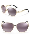 An arched nose piece and curving arms make these oversized rounded sunglasses stand out all on their own.