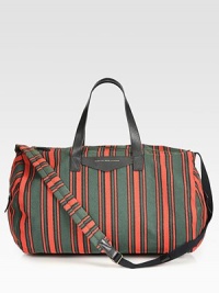 Versatile striped fabric duffle accommodates the essentials, including two tech compartments.Two leather top handlesAdjustable shoulder strap, 21.5-49.5 longTop zip closureTwo outside side zip pocketsInside zip pocketTwo tech compartmentsLined70% cotton/30% polyester20W X 13.5H X 13.5DImported