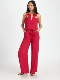 Architectural straps, slash pockets and a drawstring drop waist characterize this retro-inspired go-to. V-neckSleevelessDrawstring waistbandSlash pocketsBack button closuresBack zipperInseam, 32PolyesterDry cleanImportedModel shown is 5'10 (177cm) wearing US size Small. Architectural straps, slash pockets and a drawstring drop waist characterize this retro-inspired go-to. V-neckSleevelessDrawstring waistbandSlash pocketsBack button closuresBack zipperInseam, 32PolyesterDry cleanImportedModel shown is 5'10 (177cm) wearing US size Small.