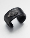 From the Envy Collection. The eye that aodrns this sleek resin cuff is closed in quiet repose, outlined in black rhodium-plated sterling silver, it's lid paved with black cubic zirconia.Black cubic zirconiaRhodium-plated sterling silverResinDiameter, about 2.25Imported