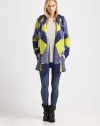 Lengthy wool-blend cardigan with a touch of cashmere, styled with a bold graphic pattern, attached hood and slash pockets. Shawl collarAttached hoodLong sleevesSlash pockets33% viscose/23% nylon/18% cotton/21% wool/5% cashmereDry cleanImportedModel shown is 5'10 (177cm) wearing US size Small.
