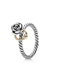A ring so glamorous that it wears one of its own! PANDORA's sterling silver rose style gains eye-catching movement with a 14K gold dangling band. A ring so glamorous that it wears one of its own! PANDORA's sterling silver rose style gains eye-catching movement with a 14K gold dangling band.