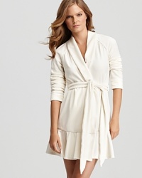 With a ruffled hem, Juicy Couture's velour robe lends flirty flair over chemises and nightshirts. With a ruffled hem, Juicy Couture's velour robe lends flirty flair over chemises and nightshirts.
