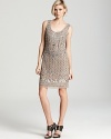 Aidan Mattox's intricately beaded dress channels vintage glamour when paired with antique-inspired jewels.