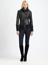 Intricate seams lend fashion-forward appeal to this supple leather jacket. Classic cable knit offers a touch of chic coziness. Fold-down collarCable-knit collar, cuffs and hemZipper closureSlash pocketsAbout 21 from shoulder to hemBody: lambskin leatherCable-knit details: 37% acrylic/26% wool/23% polyester/9% alpaca/5% polyamideDry clean by leather specialistImported Model shown is 5'10 (177cm) wearing US size Small. Intricate seams lend fashion-forward appeal to this supple leather jacket. Classic cable knit offers a touch of chic coziness. Fold-down collarCable-knit collar, cuffs and hemZipper closureSlash pocketsAbout 21 from shoulder to hemBody: lambskin leatherCable-knit details: 37% acrylic/26% wool/23% polyester/9% alpaca/5% polyamideDry clean by leather specialistImported Model shown is 5'10 (177cm) wearing US size Small.