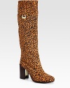 Leopard-print calf hair in a knee-high silhouette with goldtone buckle hardware and a partially lacquered heel. Stacked, lacquered heel, 3½ (90mm)Shaft, 16Leg circumference, 14Leopard-print calf hair upperLeather liningLeather and rubber solePadded insoleImportedOUR FIT MODEL RECOMMENDS ordering one half size up as this style runs small. 