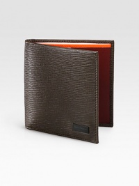 Slim design crafted in Italy from pebbled Italian leather, highlights a side profile with a bold, contrasting interior and plenty of slots to keep your cards neatly secured.One billfold compartmentEight card slotsLeather4W x 3HMade in Italy