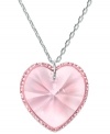 Express your affection for someone special with this sweet, romantic design. Swarovki's Reverie pendant features a perfectly-faceted light rose crystal pendant wrapped in a delicate Pointiage edging. Crafted in silver tone mixed metal. Approximate length: 15 inches. Approximate drop: 3/4 inch.