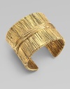 Richly textured with an organic look, this golden cuff has the sculptural appearance of wrapped and tied threads.GoldplatedDiameter, about 2¼Width, about 2Made in France