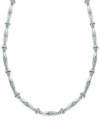 Take on trendy turquoise this season. Lauren by Ralph Lauren's stylish necklace combines turquoise beads with silver tone mixed metal for a chic look. Approximate length: 18 inches + 2-inch extender.