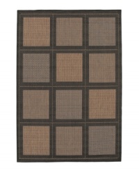 Like a patchwork quilt, 12 squares sit on the surface of this beautiful all-weather rug, each containing one of three distinctive textures. Suitable for use both indoors and out, this piece brings a touch of warmth to stone entryways, patio decks and all other outdoor gathering areas. Perfectly complimenting its natural surroundings, this rug is textured and gently colored with black and shades of cocoa. Pet friendly and resistant to all mold and mildew. One-year limited warranty. Like a patchwork quilt, 12 squares sit on the surface of this beautiful all-weather rug, each containing one of three distinctive textures. Suitable for use both indoors and out, this piece brings a touch of warmth to stone entryways, patio decks and all other outdoor gathering areas. Perfectly complimenting its natural surroundings, this rug is textured and gently colored with black and shades of cocoa. Pet friendly and resistant to all mold and mildew. One-year limited warranty.