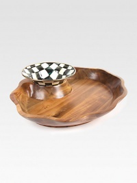 The perfect pair for your next soiree, with a hand-painted enamel bowl and a carved acacia tray with a romantic fluted silhouette.From the Courtly Check collectionEnameled steel bowl with bronzed stainless steel rimCarved acacia baseBowl: 7¾ diam.Base: 17½ x 14½Hand washImported The perfect pair for your next soiree, with a hand-painted enamel bowl and a carved acacia tray with a romantic fluted silhouette.From the Courtly Check collectionEnameled steel bowl with bronzed stainless steel rimCarved acacia baseBowl: 7¾ diam.Base: 17½ x 14½Hand washImported