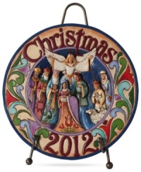 A beautiful, artful reminder to the true meaning of Christmas, this commemorative plate portrays a colorful manger scene with a joyous angel heralding in good tidings for the year to come. A beautiful, artful reminder to the true meaning of Christmas, this commemorative plate portrays a colorful manger scene with a joyous angel heralding in good tidings for the year to come.