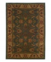 Embrace a serene space. The calming colors of this decorative rug create soothing surroundings in your home while adding delightful designs of swaying leaves and alluring sprouting foliage.