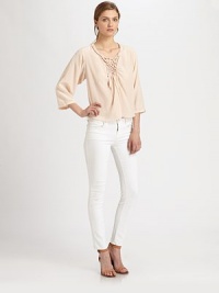 Intricate macrame neckline adds boho charm to this cropped silk blouse. Macrame necklineThree-quarter sleevesCropped back tulip hemAbout 21 from shoulder to hemSilkDry cleanImportedModel shown is 5'10 (177cm) wearing US size 2. Intricate macrame neckline adds boho charm to this cropped silk blouse. Macrame necklineThree-quarter sleevesCropped back tulip hemAbout 21 from shoulder to hemSilkDry cleanImportedModel shown is 5'10 (177cm) wearing US size 2.