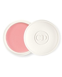 Tucked inside an elegant white case, Crème de Rose is a smoothing, plumping lip balm with a delicate rose scent. Essential oils and shea butter nourish and moisturize lips. Wonderful applied on its own or under any other lipcolor. SPF 10. In one universal petal pink shade.
