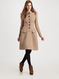 Sophisticated and ladylike, shaped with impeccable princess seams.Foldover collarSlightly puffed long sleevesButton frontFlap pocketsPrincess seamsBack button waist beltFully linedAbout 40 from shoulder to hem54% wool/30% polyester/13% polyamide/3% elastaneDry cleanMade in ItalyModel shown is 5'9 (175cm) wearing US size 4. Sophisticated and ladylike, shaped with impeccable princess seams.Foldover collarSlightly puffed long sleevesButton frontFlap pocketsPrincess seamsBack button waist beltFully linedAbout 40 from shoulder to hem54% wool/30% polyester/13% polyamide/3% elastaneDry cleanMade in ItalyModel shown is 5'9 (175cm) wearing US size 4.