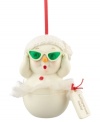 Ready for her closeup, the Hollywood baby snowman slips on evergreen-tinted shades for a bit of holiday drama. A knitted cap completes her chic look from Department 56.
