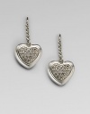 From the Cable Heart Collection. Graceful hearts, encrusted with pavé diamonds, drop from sterling silver cables. Diamonds, 1.1 tcw Sterling silver Drop, about ½ Ear wire Imported