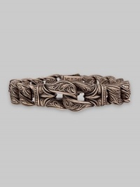 A stunning addition in warm, cocoa bronze and 18k gold with detailed Sparta engraving. About 8½ long, ¾ diam. Dual-locking closure Made in USA A stunning addition in warm, cocoa bronze and 18k gold with detailed Sparta engraving. About 8½ long, ¾ diam. Dual-locking closure Made in USA