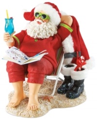 Off-duty Santa! After delivering all those gifts, the big guy deserves to sit back and relax. Sitting on a beach chair with a drink in hand, Santa unwinds and lets his toes run through the sand. Off-duty Santa! After delivering all those gifts, the big guy deserves to sit back and relax. Sitting on a beach chair with a drink in hand, Santa unwinds and lets his toes run through the sand.