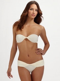 A twisted bikini bandeau top with versatile straps and matching bottoms combine to create the perfect swim style. Bandeau top with light paddingBack tie closureAdjustable strapsFully lined86% polyamide/14% elastaneHand washImported A twisted bikini bandeau top with versatile straps and matching bottoms combine to create the perfect swim style. Bandeau top with light paddingBack tie closureAdjustable strapsFully lined86% polyamide/14% elastaneHand washImported