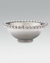 This rounded bowl in handcrafted of sandcast recycled aluminum has a pretty beaded rim. From the use of these raw materials to the design process, every step is ecologically sound, contributing to a cleaner environment. From the String of Pearls Collection 2¼H X 6D Wipe clean Imported