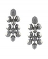 Alluring from every angle. Faceted crystal accents lend geometric glamour to these dressy drop earrings from Vince Camuto. Crafted in hematite tone mixed metal. Approximate drop: 3 inches.